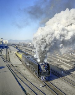 Union Pacific Railroad steam locomotive no. 8444 leads westbound excursion train no. 9, the <i> City of Kansas</i>, at Union Station in Denver, Colorado on March 29, 1971. Photograph by Victor Hand. Hand-UP-C64-42.JPG;