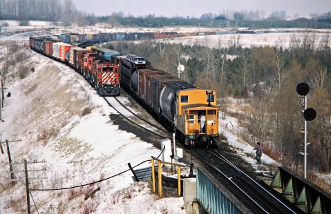Eastbound and westbound Canadian Pacific Railway freight trains meet at Woodstock, Ontario, on February 7, 1987. Photograph by John F. Bjorklund, © 2015, Center for Railroad Photography and Art. Bjorklund-39-01-04