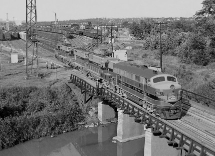 Central of Georgia Railway freight train no. 38 has arrived at Thomas Yard of Birmingham, Alabama, and its motive power is pulling away from train in May 1955. It will now head to the road's diesel shop (out of frame to left). Photograph by J. Parker Lamb, © 2016, Center for Railroad Photography and Art. Lamb-02-012-03