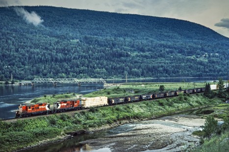 Southbound Canadian Pacific Railway freight train along the Kootenary River near Beasley, British Columbia, on July 13, 1983. Photograph by John F. Bjorklund, © 2015, Center for Railroad Photography and Art. Bjorklund-38-07-14
