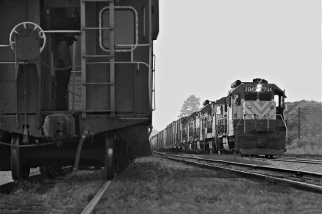Birmingham freight train departs yard at Amory, Mississippi, in late afternoon behind GP35s with top-mounted air tanks in August 1973. Photograph by J. Parker Lamb, © 2016, Center for Railroad Photography and Art. Lamb-02-003-01