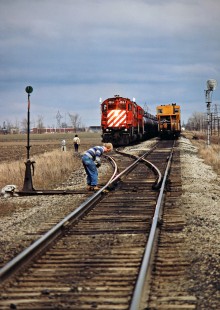 Westbound and eastbound Canadian Pacific Railway freight trains meeting at Tilbury, Ontario, on April 17, 1982. Photograph by John F. Bjorklund, © 2015, Center for Railroad Photography and Art. Bjorklund-37-17-08