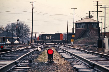 Westbound Grand Trunk Western Railroad freight train crossing Erie Lackawanna main line at Griffith, Indiana, on April 1, 1973. Photograph by John F. Bjorklund, © 2016, Center for Railroad Photography and Art. Bjorklund-58-13-01