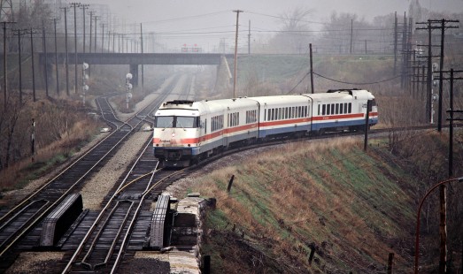 Southbound Amtrak no. 68 on Canadian Pacific Railway track near Adirondack in Montreal West, Quebec, on April 26, 1980. Photograph by John F. Bjorklund, © 2015, Center for Railroad Photography and Art. Bjorklund-37-10-10