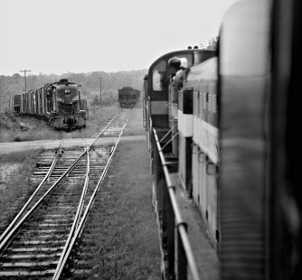 With rain falling and darkness approaching, the photographer made one last shot of his trip in the cab of a Tennessee Central Railway freight train as it passed a local at Campbell Junction, east of Monterey, Tennessee, in April 1962. Photograph by J. Parker Lamb, © 2016, Center for Railroad Photography and Art. Lamb-02-028-04