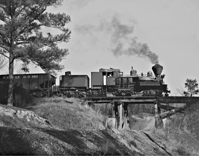 Side view of Twin Seams Mining Company Shay no. 5 and train nearing summit tunnel at Kellerman, Alabama, in December 1959. Photograph by J. Parker Lamb, © 2016, Center for Railroad Photography and Art. Lamb-02-037-01