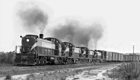 Georgia-bound Seaboard Air Line Railroad freight train departs yard at Montgomery, Alabama, behind a quartet of smoking Alco diesels in June 1955. Photograph by J. Parker Lamb, © 2016, Center for Railroad Photography and Art. Lamb-02-021-07