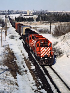 Westbound Canadian Pacific Railway freight train at Puslinch, Ontario, on March 9, 1985. Photograph by John F. Bjorklund, © 2015, Center for Railroad Photography and Art. Bjorklund-38-17-05
