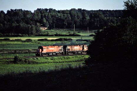 Eastbound Canadian Pacific Railway freight train near Komoka, Ontario, on July 7, 1984. Photograph by John F. Bjorklund, © 2015, Center for Railroad Photography and Art. Bjorklund-38-12-09