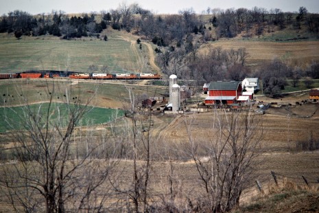 Eastbound Illinois Central Gulf Railroad freight train in Peosta, Iowa, on April 7, 1984. Photograph by John F. Bjorklund, © 2016, Center for Railroad Photography and Art. Bjorklund-60-18-08