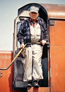 Canadian Pacific Railway engineman J.H. Clarke on westbound train in Walkerville, Ontario, on April 14, 1973. Photograph by John F. Bjorklund, © 2015, Center for Railroad Photography and Art. Bjorklund-36-14-22