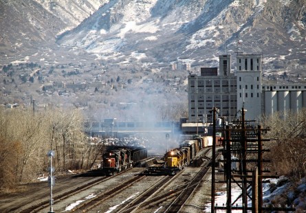 Southern Pacific and Union Pacific trains in Ogden, Utah, on May 13, 1986. Photograph by John F. Bjorklund, © 2015, Center for Railroad Photography and Art. Bjorklund-48-19-03