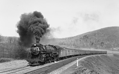 Erie Railroad 4-6-2 steam locomotive no. 2938 puling eastbound passenger train no. 2, "The Erie Limited, at Lanesboro, Pennsylvania, on April 20, 1941. Photograph by Donald W. Furler, © 2017, Center for Railroad Photography and Art, Furler-10-012-01