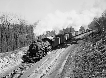 Erie Railroad 2-8-4 steam locomotive no. 3322 pulling the second section of westbound freight train no. 91 with 57 cars at Otisville, New York, on April 28, 1946. Photograph by Donald W. Furler, © 2017, Center for Railroad Photography and Art, Furler-11-008-02