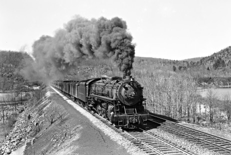 Delaware, Lackawanna and Western Railroad 4-8-2 steam locomotive no. 1452 leads eastbound passenger train no. 2 east of cut-off tunnel near Andover, New Jersey, in April of 1941. Photograph by Donald Furler. Furler-11-110-01.JPG; © 2017, Center for Railroad Photography and Art