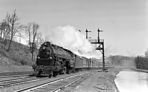 Reading Company 4-6-2 steam locomotive no. 213 pulling an eastbound passenger train along the Lehigh Coal & Navigation Company canal as it approaches the Allentown Yard at Allentown, Pennslyvania on April 17, 1949. Photograph by Donald W. Furler,  © 2017, Center for Railroad Photography and Art, Furler-19-011-02