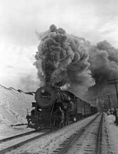 Reading Company 2-8-0 steam locomotive no. 1956 pulling a westbound freight train at Tamaqua, Pennsylvania, on January 26, 1946. Photograph by Donald W. Furler, © 2017, Center for Railroad Photography and Art, Furler-15-089-02