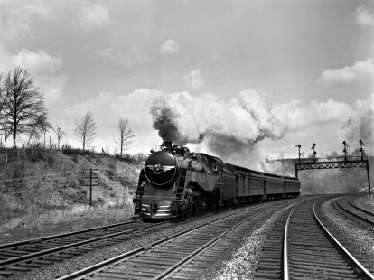 Delaware, Lackawanna, and Western Railroad 4-6-0 steam locomotive no. 1011 leads westbound passenger train in near Montville, New Jersey in 1940. Photograph by Donald Furler. Furler-03-012-04.JPG; © 2017, Center for Railroad Photography and Art
