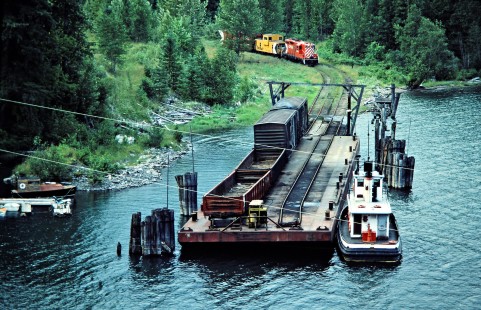 Canadian Pacific Railway local freight train unloading from the barge that brought it across Slocan Lake in Rosebery, British Columbia, on July 14, 1983. Photograph by John F. Bjorklund, © 2015, Center for Railroad Photography and Art. Bjorklund-38-08-19