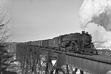 Erie Railroad 2-8-4 steam locomotive no. 3371 pulling the first section of eastbound freight train no. 98 with 92 cars across the Moodna Viaduct at Salisbury Mills, New York, on February 9, 1941. Photograph by Donald W. Furler, © 2017, Center for Railroad Photography and Art, Furler-24-101-03