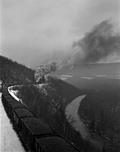 Reading Company 2-8-0 steam locomotives nos. 1641 and 1644 pushing an 80-car coal train (with locomotive no. 1751 leading) up Catawissa Creek at McCauley, Pennsylvania, on November 17, 1940. This was the first of three eastbound trains that ran in close succession every Sunday afternoon on the Catawissa Branch. Photograph by Donald W. Furler, © 2017, Center for Railroad Photography and Art, Furler-03-108-03