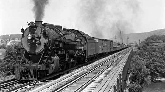Reading Company 2-8-0 steam locomotive no. 2011 leads a westbound freight train approaching the east junction of the wye crossing Lehigh River bridges at Allentown, Pennsylvania, in July of 1938. Photograph by Donald W. Furler, © 2017, Center for Railroad Photography and Art, Furler-08-056-01