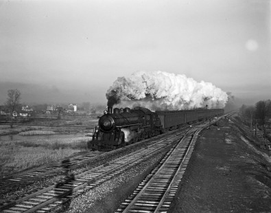 Erie Railroad 4-6-2 steam locomotive no. 2511 pulling eastbound passenger train no. 184 through Passaic Junction at Elmwood Park (formerly known as  East Paterson), New Jersey in 1940. Photograph by Donald W. Furler, © 2017, Center for Railroad Photography and Art, Furler-03-025-03