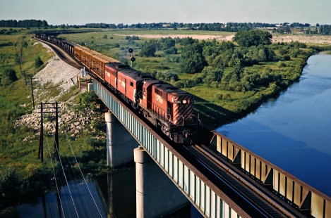 Westbound Canadian Pacific Railway freight train crossing the Thames River at Woodstock, Ontario, on June 29, 1975. Photograph by John F. Bjorklund, © 2015, Center for Railroad Photography and Art. Bjorklund-36-28-05