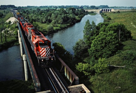 Westbound Canadian Pacific Railway freight train crossing Thames River in Woodstock, Ontario, on July 3, 1982. Photograph by John F. Bjorklund, © 2015, Center for Railroad Photography and Art. Bjorklund-37-18-13