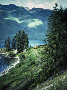 Northbound Canadian Pacific Railway at Slocan Lake in Rosebery, British Columbia, on July 14, 1983. Photograph by John F. Bjorklund, © 2015, Center for Railroad Photography and Art. Bjorklund-38-08-07