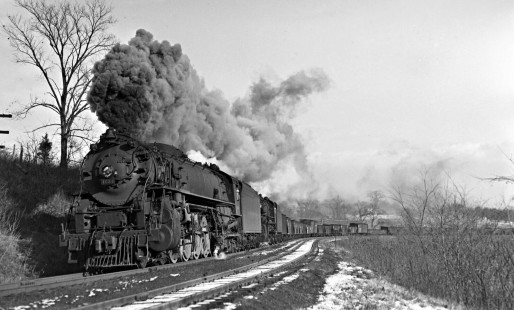 Delaware, Lackawanna and Western Railroad 4-8-4 steam locomotive no. 1634 and 4-8-2 no. 2228 lead westbound freight train in Buttzville, New Jersey, on January 5, 1941. Photograph by Donald Furler; Furler-24-117-03.JPG; © 2017, Center for Railroad Photography and Art