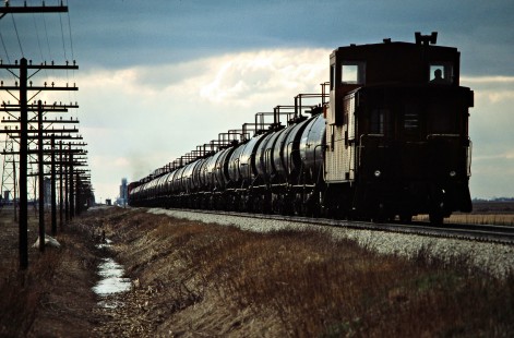 Westbound Canadian Pacific Railway freight train near Tilbury, Ontario, on April 17, 1982. Photograph by John F. Bjorklund, © 2015, Center for Railroad Photography and Art. Bjorklund-37-17-01