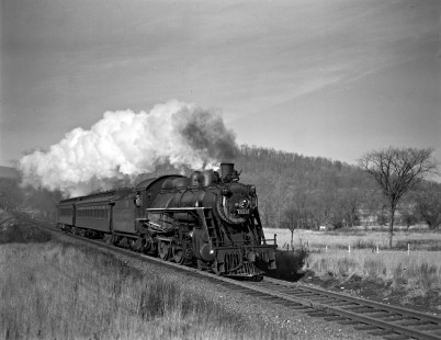 Delaware, Lackawanna and Western Railroad 4-4-0 steam locomotive no.978 leads eastbound passenger train near Waterloo, New Jersey, in 1940. Photograph by Robert Hadley. Furler-03-011-03.JPG; © 2017, Center for Railroad Photography and Art