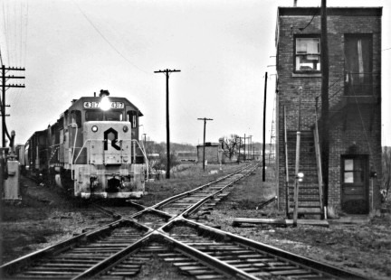Rock Island freight train with GP38-2 no. 4317 passing a tower in 1978.
