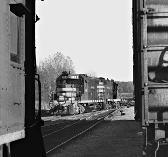 Meridian and Bigbee Railroad units pass caboose as the crew heads for shop at end of work day in March 1985. Photograph by J. Parker Lamb, © 2016, Center for Railroad Photography and Art. Lamb-02-034-06