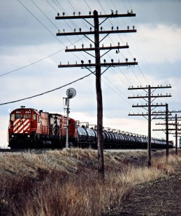 Westbound Canadian Pacific Railway freight train near Tilbury, Ontario, on April 17, 1982. Photograph by John F. Bjorklund, © 2015, Center for Railroad Photography and Art. Bjorklund-37-17-15