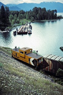Caboose (or van) of a northbound Canadian Pacific Railway freight train at Slocan Lake in Rosebery, British Columbia, on July 14, 1983. Photograph by John F. Bjorklund, © 2015, Center for Railroad Photography and Art. Bjorklund-38-08-08