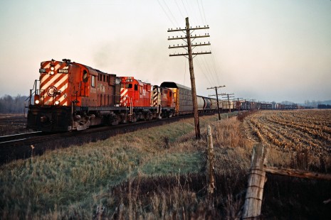 Westbound Canadian Pacific Railway freight train near Zorra, Ontario, on November 24, 1984. Photograph by John F. Bjorklund, © 2015, Center for Railroad Photography and Art. Bjorklund-38-16-17