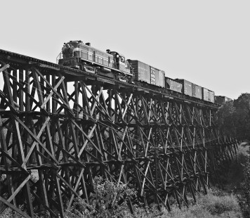 Tennessee Central Railway RS2 locomotive pulls westbound local over trestle at Clarksville, Tennessee, in September 1959. Photograph by J. Parker Lamb, © 2016, Center for Railroad Photography and Art. Lamb-02-027-01