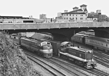 Southern Railway switcher passes waiting Seaboard Air Line Railroad eastbound <i>Silver Comet</i> passenger train at Atlanta, Georgia, in October 1954. Photograph by J. Parker Lamb, © 2016, Center for Railroad Photography and Art. Lamb-02-038-02