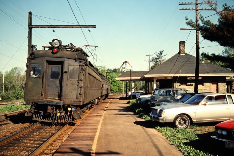 Eastbound Conrail (ex-Erie Lackawanna) commuter passenger train pulling into station at Millington, New Jersey, on May 7, 1981. Photograph by John F. Bjorklund, © 2015, Center for Railroad Photography and Art. Bjorklund-57-09-08