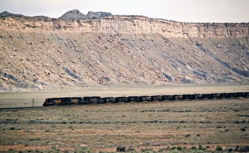 Westbound Denver and Rio Grande Western Railroad cola train at Crescent Junction, Utah, on May 10, 1986. Photograph by John F. Bjorklund, © 2015, Center for Railroad Photography and Art. Bjorklund-48-11-13