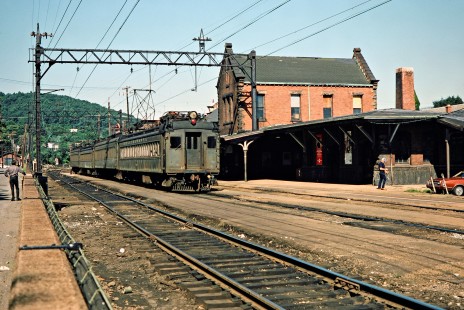 Eastbound Erie Lackawanna commuter passenger train at station in Dover, New Jersey, on July 27, 1975. Photograph by John F. Bjorklund, © 2015, Center for Railroad Photography and Art. Bjorklund-57-01-15