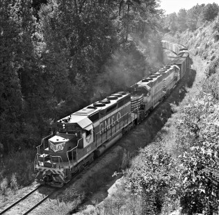 Gulf, Mobile and Ohio Railroad SD40 locomotive and freight train leave Union, Mississippi, for run to Jackson in August 1968. Photograph by J. Parker Lamb, © 2016, Center for Railroad Photography and Art. Lamb-01-129-02