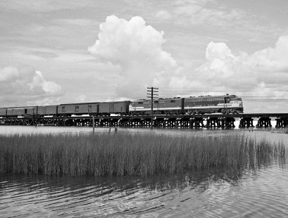 Mobile-bound Louisville and Nashville Railroad <i>Azalean</i> passenger train crosses Biloxi Bay trestle in July 1956. Photograph by J. Parker Lamb, © 2016, Center for Railroad Photography and Art. Lamb-01-137-05