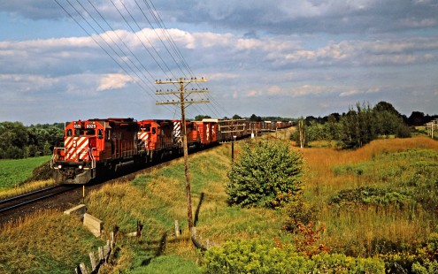 Westbound Canadian Pacific Railway near Hyde Park, Ontario, on August 30, 1986. Photograph by John F. Bjorklund, © 2015, Center for Railroad Photography and Art. Bjorklund-38-26-03