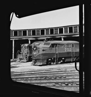 Gulf, Mobile and Ohio Railroad locomotives in roundhouse at Meridian, Mississippi, viewed the window of an Alco RS2 locomotive, in August 1954. Photograph by J. Parker Lamb, © 2016, Center for Railroad Photography and Art. Lamb-01-123-04