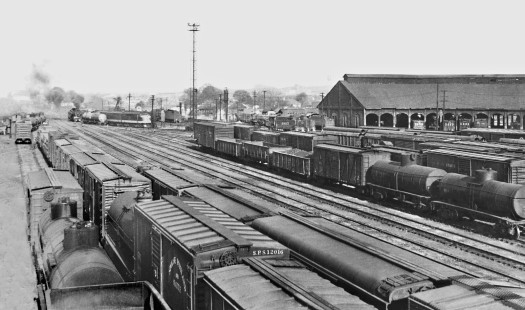 Panoramic view of joint Illinois Central Railroad-Southern Railway yard and roundhouse in Meridian, Mississippi, in August 1950. Along with steam power from both lines, a brace of Southern F-units illustrates the beginning of the post-World War II motive power transition. Photograph by J. Parker Lamb, © 2016, Center for Railroad Photography and Art. Lamb-01-100-03