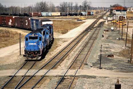 Conrail freight train at Ridgeway, Ohio, on March 21, 1987, where Conrail east-west and north-south lines crossed. This train is turning from eastward to southward to head toward Columbus on the former Toledo & Ohio Central line. Photograph by John F. Bjorklund, © 2015, Center for Railroad Photography and Art. Bjorklund-30-11-13