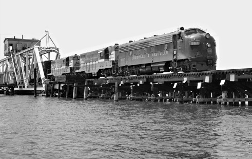 Mobile-bound Louisville and Nashville Railroad freight train crawls across two-mile long Biloxi Bay trestle in August 1958 (note: viewed from a friend's boat). Photograph by J. Parker Lamb, © 2016, Center for Railroad Photography and Art. Lamb-01-137-11